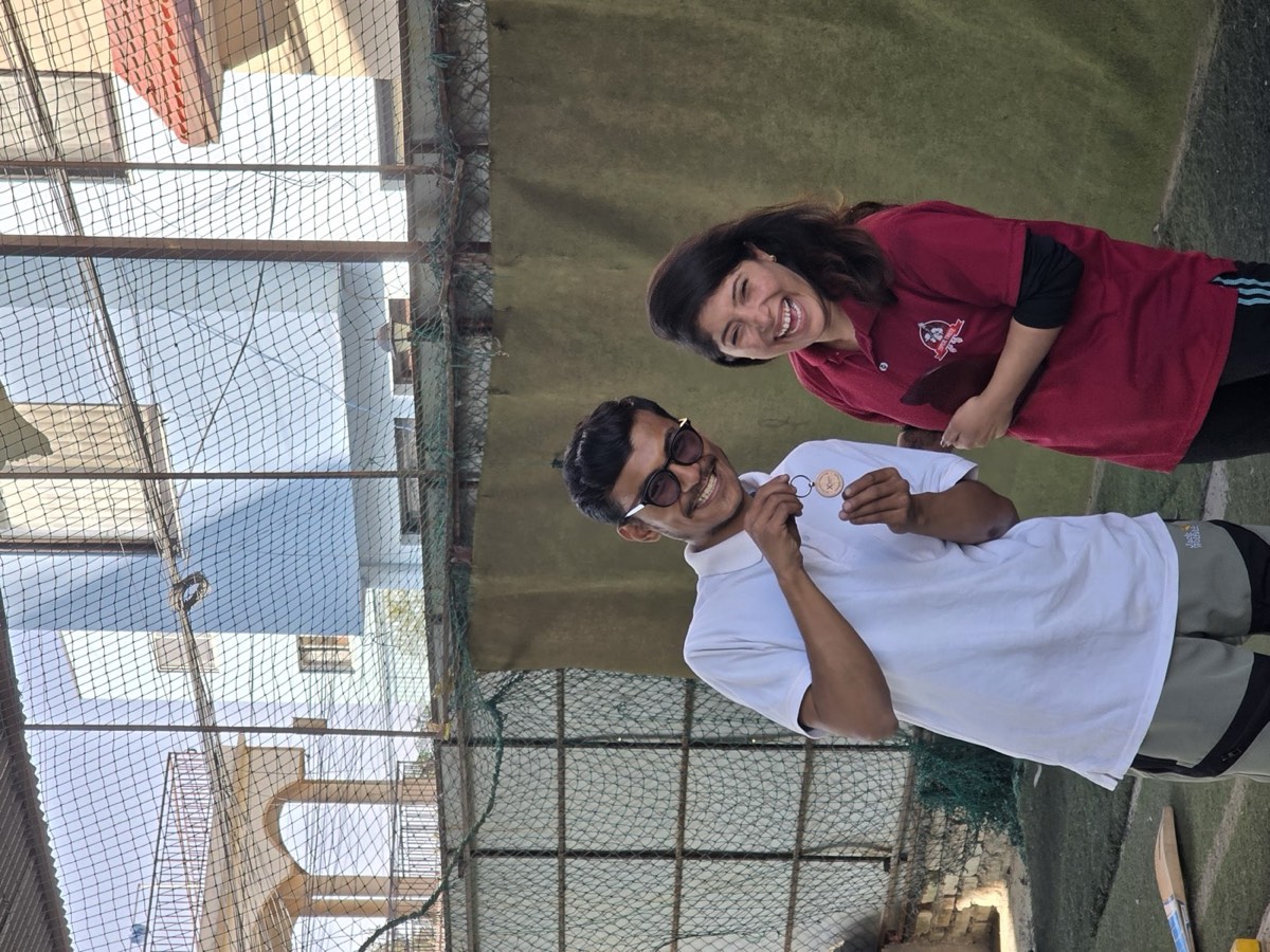 Teammates celebrating on cricket day