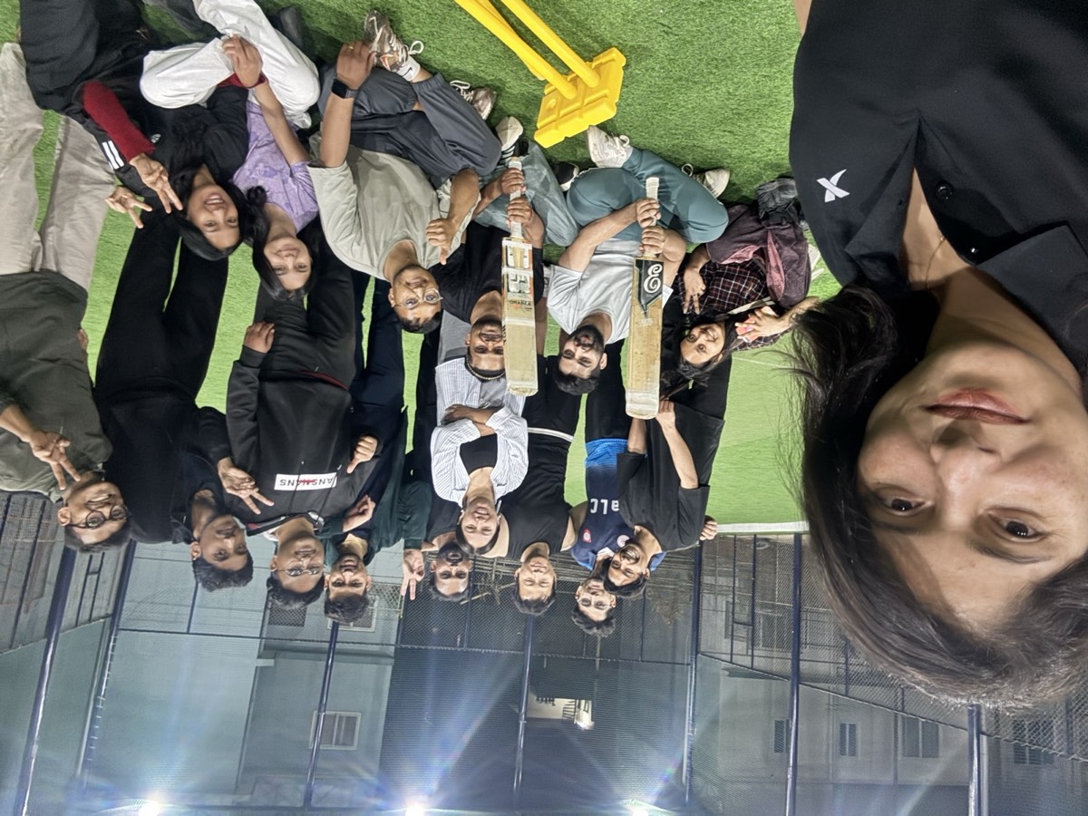 A team selfie on the turf after the game